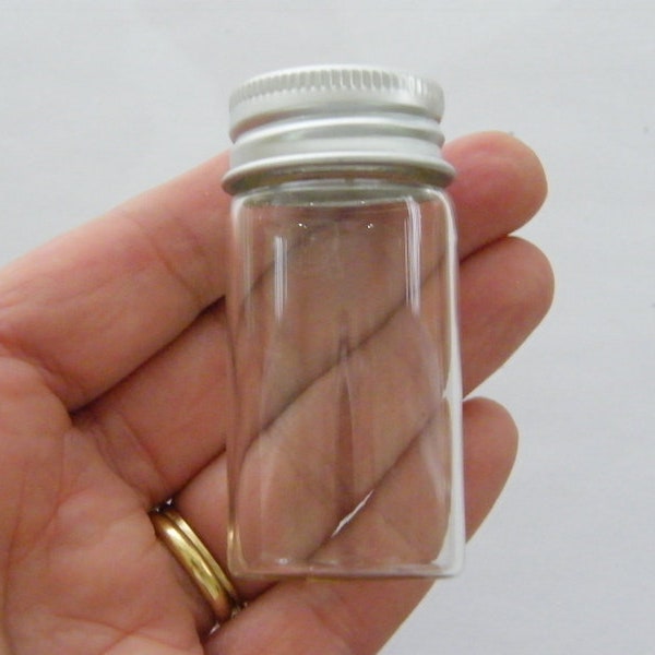 6 Mini glass bottles with screw on lids GB73