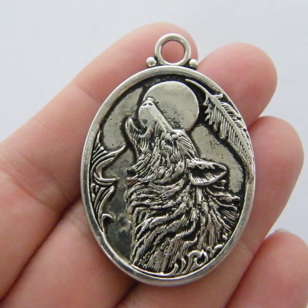 2 Wolf pendants antique silver tone A482