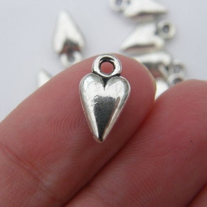 10 Heart charms tibetan silver H16