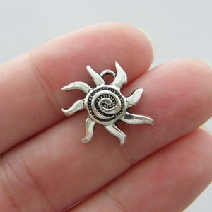 8 Sun charms antique silver tone S374