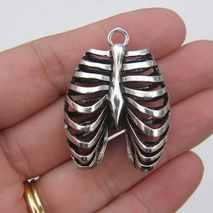 BULK 3 Rib cage pendant antique silver tone MD1