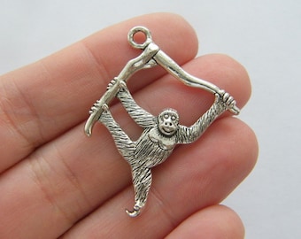 4 Orangutan pendants antique silver tone A133