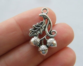 4 Acorns and leaves charms antique silver tone L244