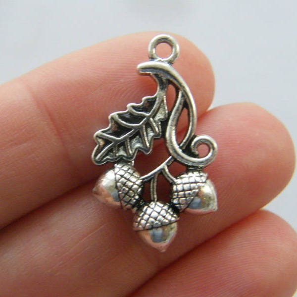 4 Acorns and leaves charms antique silver tone L244