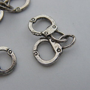BULK 30 Pair of handcuff charms antique silver tone G24 image 5