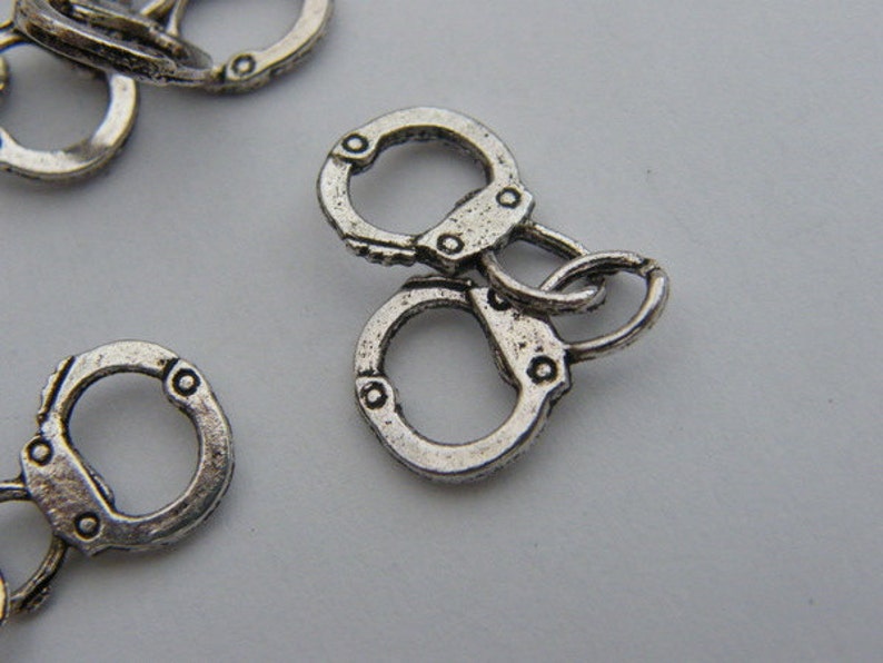 BULK 30 Pair of handcuff charms antique silver tone G24 image 5