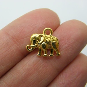 10 Elephant charms bright gold tone A245