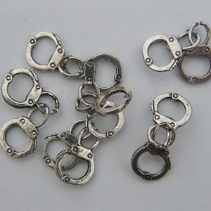 BULK 30 Pair of handcuff charms antique silver tone G24 image 2