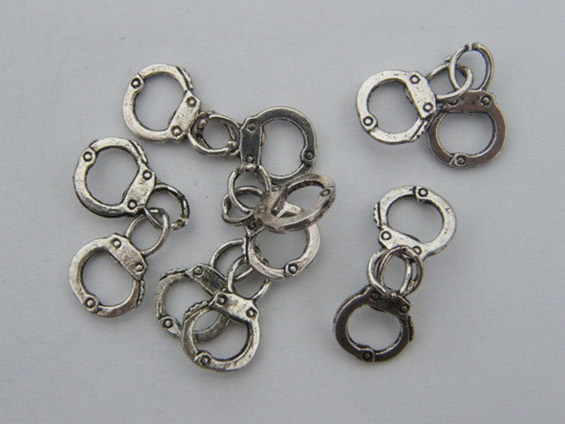 BULK 30 Pair of handcuff charms antique silver tone G24 image 2