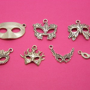 The Mask Collection - 7 different antique silver tone charms