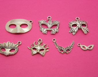 The Mask Collection - 7 different antique silver tone charms