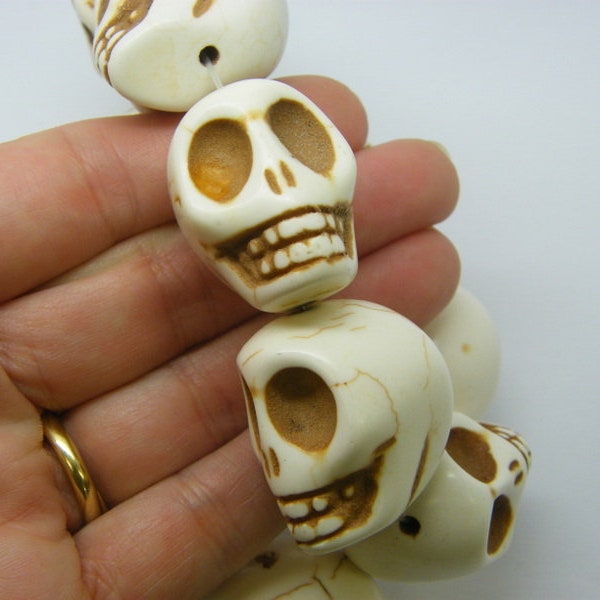 13 Super stunningly large skull beads off white HC