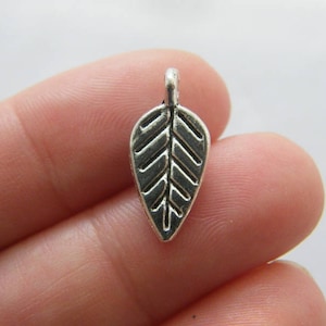 12 Leaf charms antique silver tone L6