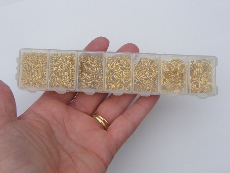 1 Box assorted jump rings 3 to 9mm gold plated 1780 pieces image 1