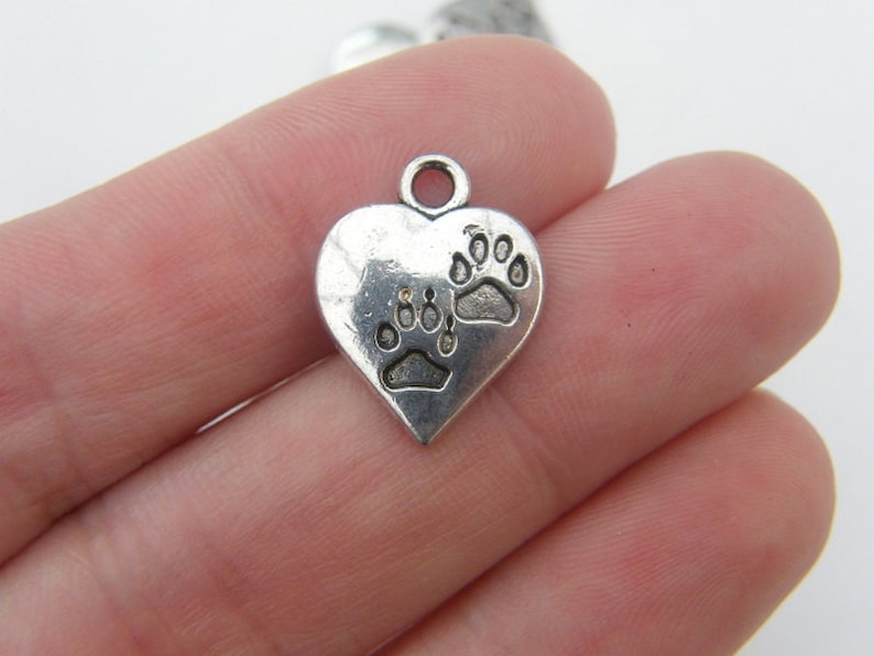 10 Heart with paw prints charms antique silver tone A477 image 1