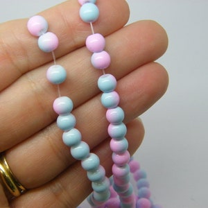 130 Two toned beads pink and blue 6mm glass B281