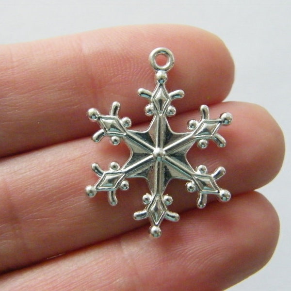 16 Snowflake charms silver plated tone SF60