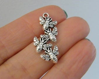 8 bijenbedels antiekzilverkleur A26