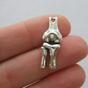 2 Knee bone charms antique silver tone MD93