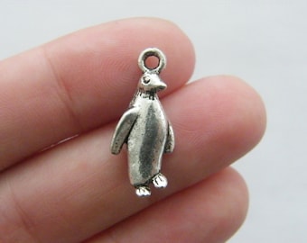 6 Penguin charms antique silver tone A170