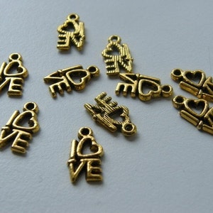 34 LOVE charms antique gold tone M242 image 3