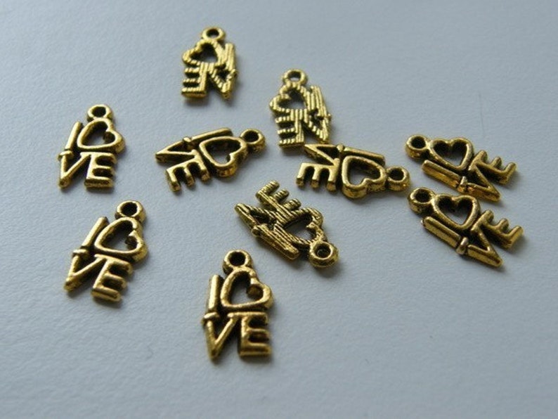 34 LOVE charms antique gold tone M242 image 3