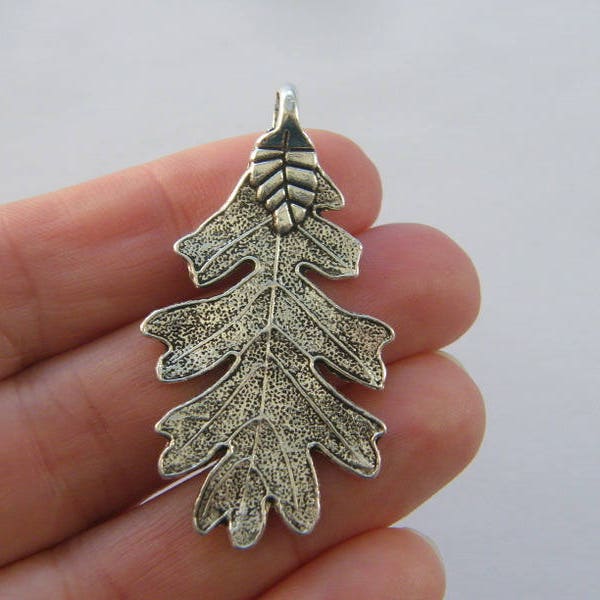 4 Leaf charms antique silver tone L106