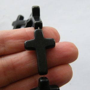 13 Black  cross beads 30 x 20 x 6mm C110