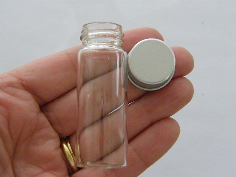 4 Mini glass bottles with screw on lids GB71 Etsy