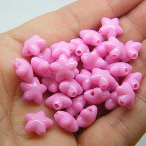 100 Star beads cotton candy pink acrylic  AB671