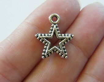 10 Star charms tibetan silver S14