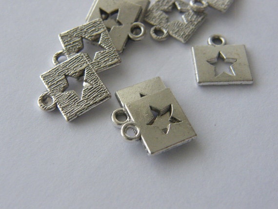14 Star charms antique silver tone S45