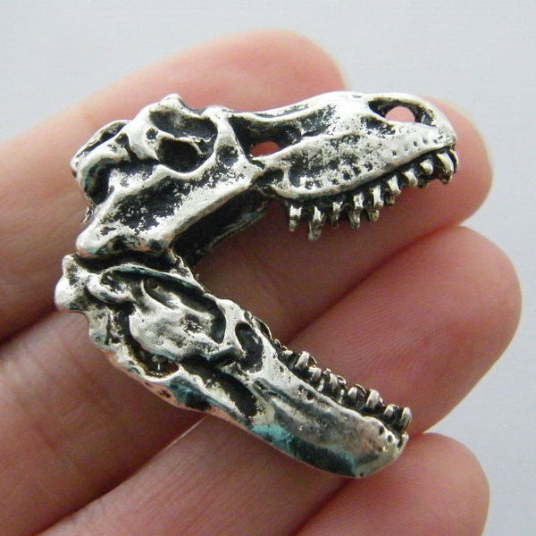 1 Dinosaur skull charm antique silver tone A490