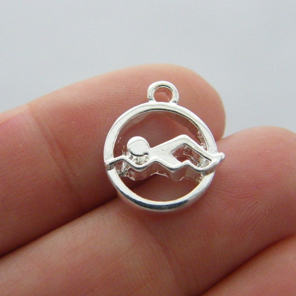 6 Swimming  charms silver plated SP72