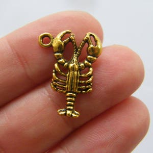 8 Lobster charms antique gold tone FF152