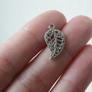 14 Leaf charms antique silver tone L27