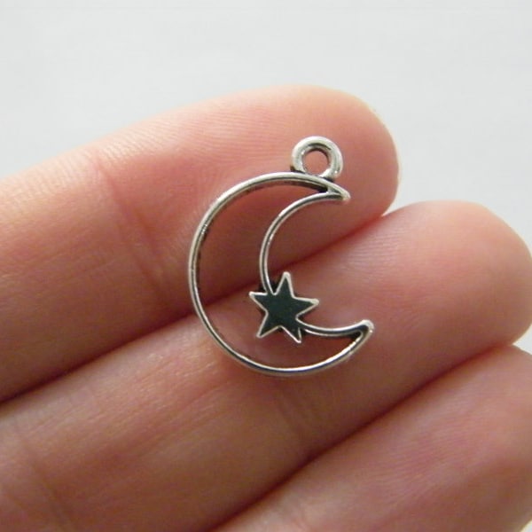 10 Moon star charms antique silver tone M110