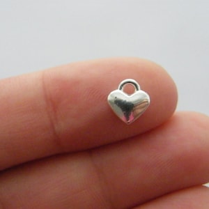 14 Heart charms silver plated tone H160