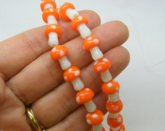 22 Mushroom beads orange and white glass L