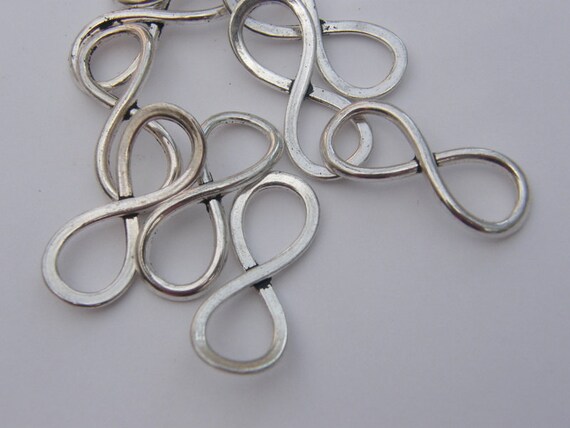 50/300pcs Antique Silver/Bronze Tone 8 Infinity Sign Charms Connectors 23x8mm 50/300pcs Antique Silver/Bronze Tone 8 Infinity Sign Charms Connectors 23x8mm