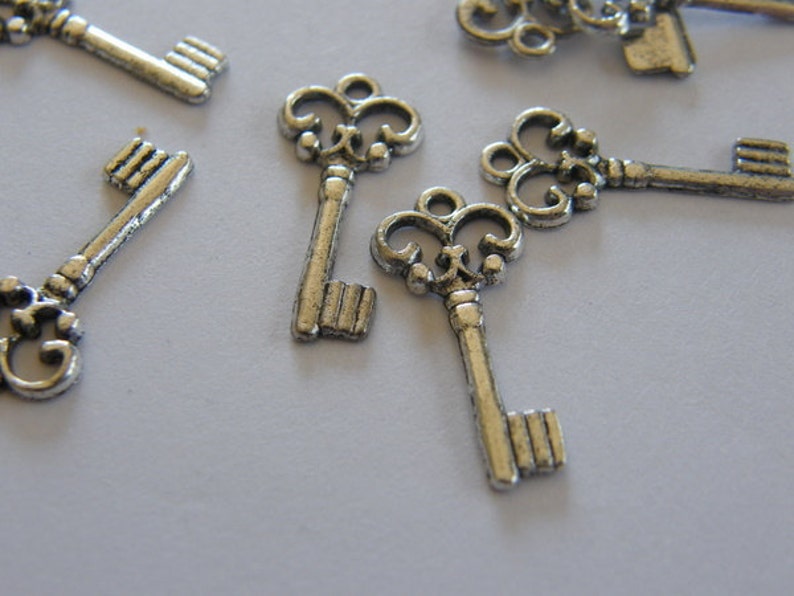 16 Key charms antique silver tone K4 image 4