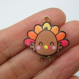 4 Turkeys charms gold and brown tone B14
