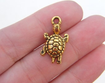 8 Tortoise charms antique gold tone FF703