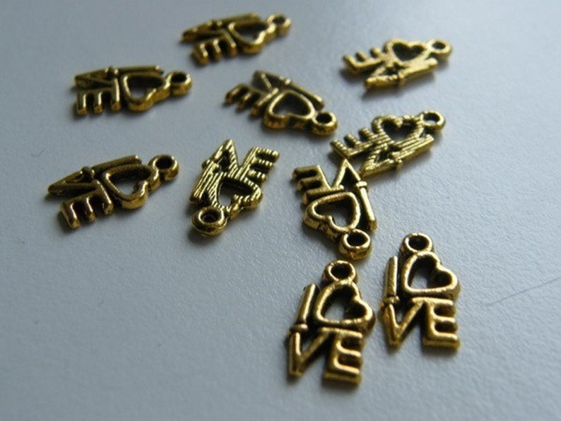 34 LOVE charms antique gold tone M242 image 5