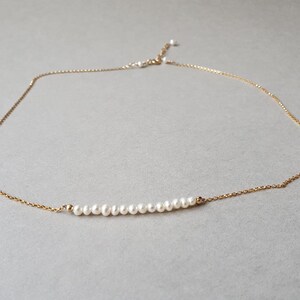 Collar de perlas de oro: delicada joya con la piedra natal de junio