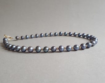 Collana di perle nere: perle coltivate, gioielli riempiti d'oro