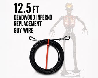 May include: A 3.81 metre black guy wire coiled in a circle and secured with an orange zip tie. The text 12.5 FT DEADWOOD INFERNO REPLACEMENT GUY WIRE is printed above the wire, with a faint illustration of a skeletal figure in the background.