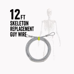 May include: A 12 ft silver metal guy wire coiled into a circle with looped ends and a bright yellow fastener. The text 12 FT SKELETON REPLACEMENT GUY WIRE is printed in black next to a faint outline of a human skeleton figure.