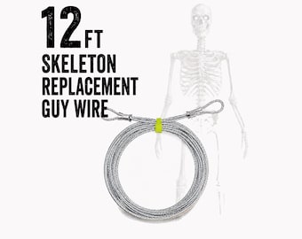 May include: A 3.66 m silver metal guy wire coiled into a circle with looped ends and a bright yellow fastener. The text 12 FT SKELETON REPLACEMENT GUY WIRE is printed in black next to a faint outline of a human skeleton figure.