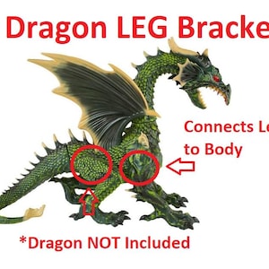 May include: A green and gold dragon figurine with red eyes and sharp teeth. The text "1x Dragon LEG Bracket" is at the top, and "Connects Leg to Body" is written on the right. The text "*Dragon NOT Included" is at the bottom.